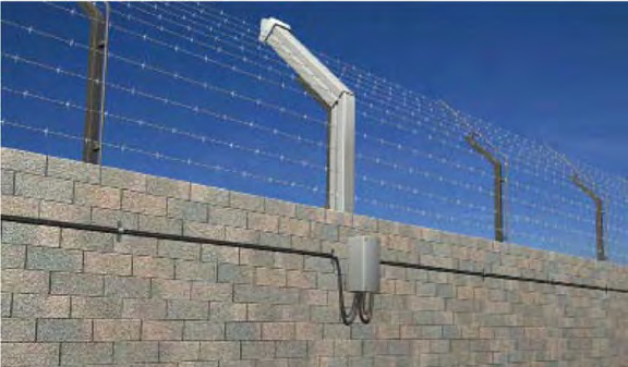 MAX1000 tension fence detection system installed on wall top