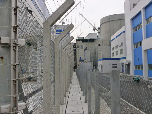 Tension detection posts at power plant perimeter